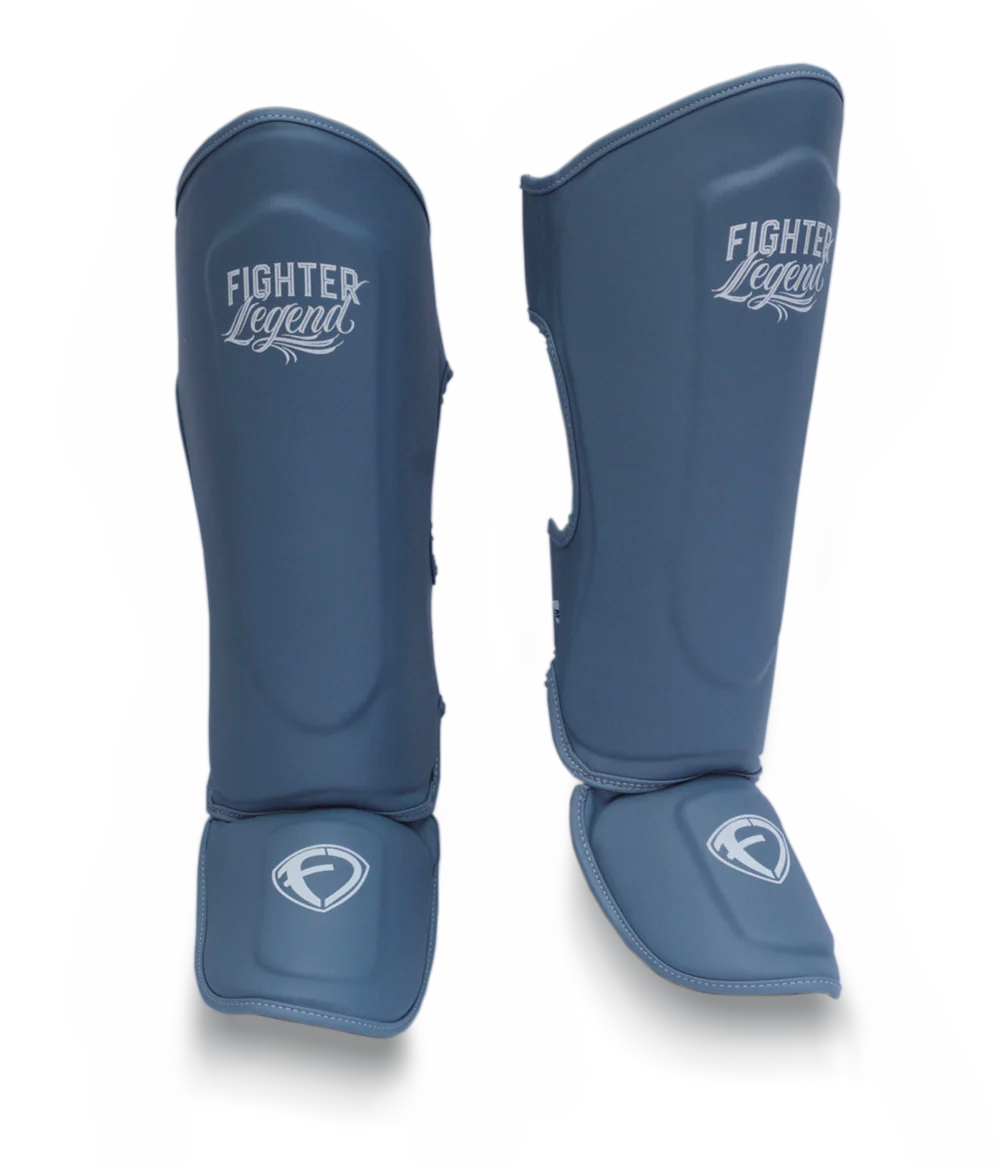 ESPINILLERA FIGHTER LEGEND GRIS PETROLEO GD